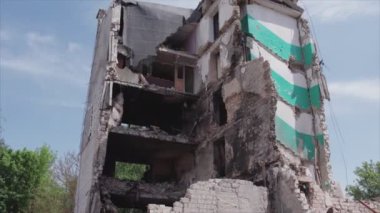 This stock video shows a destroyed residential building during the war in Ukraine in Borodyanka, Bucha district in 8K resolution