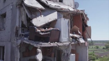 This stock video shows a destroyed residential building during the war in Ukraine in Borodyanka, Bucha district in 8K resolution