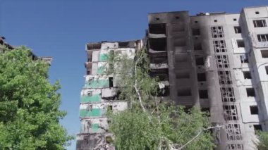 This stock video shows a destroyed residential building during the war in Ukraine in Borodyanka, Bucha district in 8K resolution