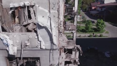 This stock video shows a destroyed residential building during the war in Ukraine in Borodyanka, Bucha district in 8K resolution