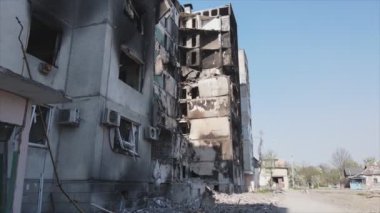 This stock video shows a destroyed residential building during the war in Ukraine in Borodyanka, Bucha district in 8K resolution