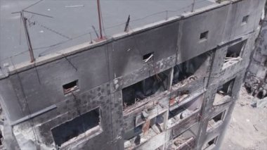 This stock video shows a destroyed residential building during the war in Ukraine in Borodyanka, Bucha district in 8K resolution