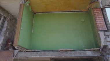 This stock video shows a destroyed residential building during the war in Ukraine in Borodyanka, Bucha district in 8K resolution