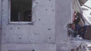 This stock video shows a destroyed residential building during the war in Ukraine in Borodyanka, Bucha district in 8K resolution