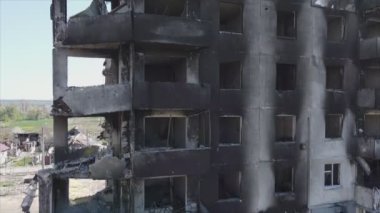 This stock video shows a destroyed residential building during the war in Ukraine in Borodyanka, Bucha district in 8K resolution