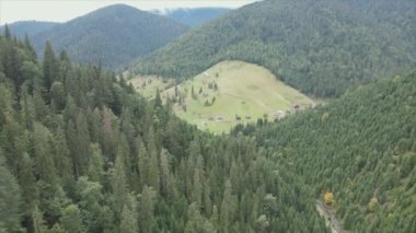 This stock footage shows aerial view of the mountain landscape of the Carpathians, Ukraine in 8K resolution