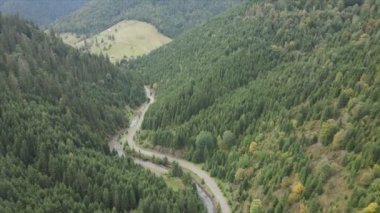 This stock footage shows aerial view of the mountain landscape of the Carpathians, Ukraine in 8K resolution