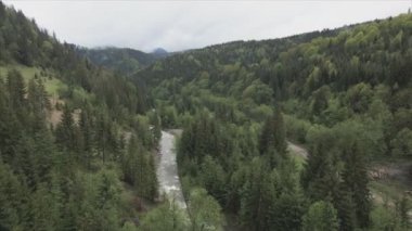 This stock footage shows aerial view of the mountain landscape of the Carpathians, Ukraine in 8K resolution