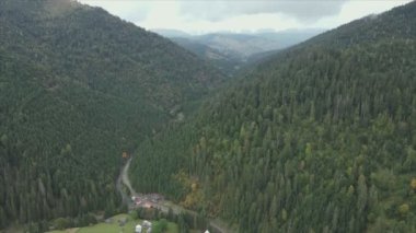 This stock footage shows aerial view of the mountain landscape of the Carpathians, Ukraine in 8K resolution