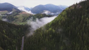 This stock footage shows aerial view of the mountain landscape of the Carpathians, Ukraine in 8K resolution