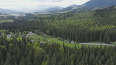 This stock footage shows aerial view of the mountain landscape of the Carpathians, Ukraine in 8K resolution