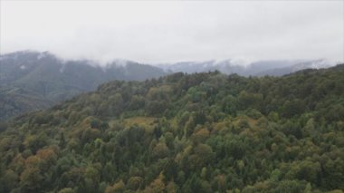 This stock footage shows aerial view of the mountain landscape of the Carpathians, Ukraine in 8K resolution