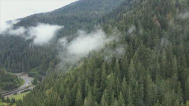 This stock footage shows aerial view of the mountain landscape of the Carpathians, Ukraine in 8K resolution