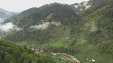 This stock footage shows aerial view of the mountain landscape of the Carpathians, Ukraine in 8K resolution