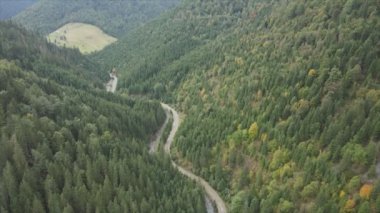 This stock footage shows aerial view of the mountain landscape of the Carpathians, Ukraine in 8K resolution