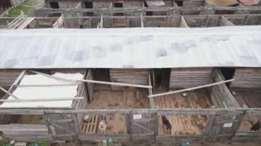 This stock footage shows an aerial view of a dog shelter in 8K resolution