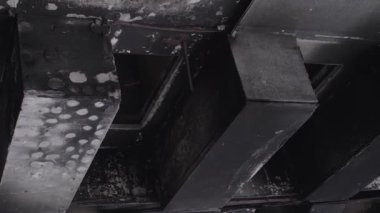 This stock vertical video shows the aftermath of the war in Ukraine - a destroyed residential building in Borodyanka, grey, flat video