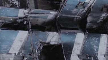 This stock vertical video shows the aftermath of the war in Ukraine - a destroyed residential building in Borodyanka, grey, flat video