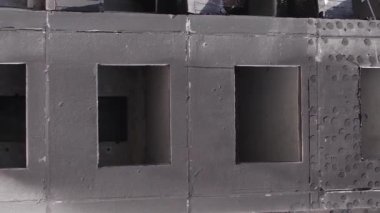 This stock vertical video shows the aftermath of the war in Ukraine - a destroyed residential building in Borodyanka, grey, flat video