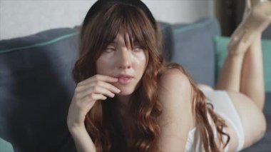 This is a stock video shows a girl in beautiful erotic sexy lingerie in 8K resolution