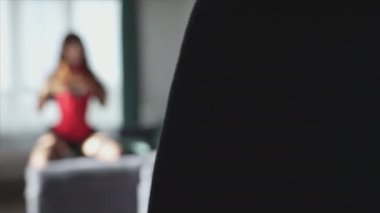 This is a stock video shows a girl in beautiful erotic sexy lingerie in 8K resolution