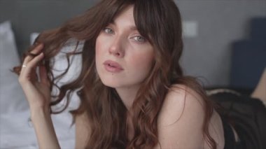 This is a stock video shows a girl in beautiful erotic sexy lingerie in 8K resolution