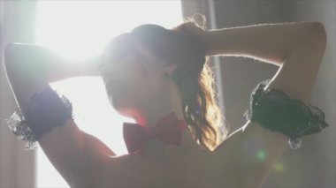 This is a stock video shows a girl in beautiful erotic sexy lingerie in 8K resolution
