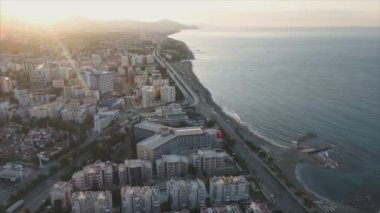 This stock footage shows aerial view of Alanya, Turkey - a resort town on the seashore in 8K resolution