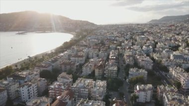 This stock footage shows aerial view of Alanya, Turkey - a resort town on the seashore in 8K resolution