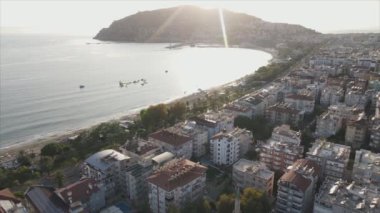 This stock footage shows aerial view of Alanya, Turkey - a resort town on the seashore in 8K resolution
