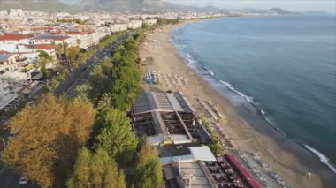This stock footage shows aerial view of Alanya, Turkey - a resort town on the seashore in 8K resolution