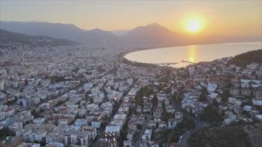 This stock footage shows aerial view of Alanya, Turkey - a resort town on the seashore in 8K resolution