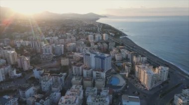 This stock footage shows aerial view of Alanya, Turkey - a resort town on the seashore in 8K resolution