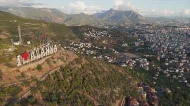 This stock footage shows aerial view of Alanya, Turkey - a resort town on the seashore in 8K resolution