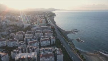 This stock footage shows aerial view of Alanya, Turkey - a resort town on the seashore in 8K resolution