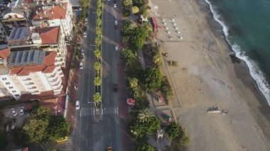 This stock footage shows aerial view of Alanya, Turkey - a resort town on the seashore in 8K resolution