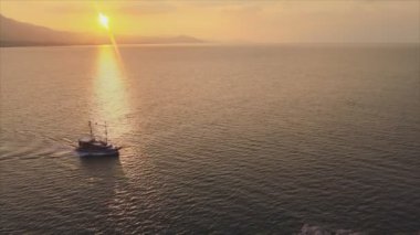 This stock footage shows aerial view of Alanya, Turkey - a resort town on the seashore in 8K resolution