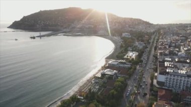 This stock footage shows aerial view of Alanya, Turkey - a resort town on the seashore in 8K resolution