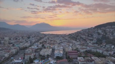 This stock footage shows aerial view of Alanya, Turkey - a resort town on the seashore in 8K resolution
