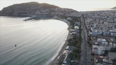 This stock footage shows aerial view of Alanya, Turkey - a resort town on the seashore in 8K resolution