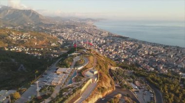 This stock footage shows aerial view of Alanya, Turkey - a resort town on the seashore in 8K resolution