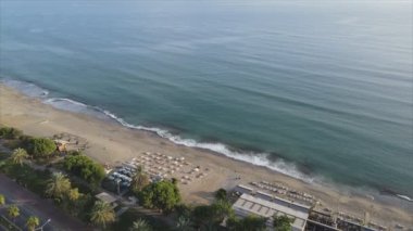 This stock footage shows aerial view of Alanya, Turkey - a resort town on the seashore in 8K resolution