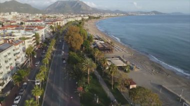 This stock footage shows aerial view of Alanya, Turkey - a resort town on the seashore in 8K resolution