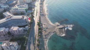 This stock footage shows aerial view of Alanya, Turkey - a resort town on the seashore in 8K resolution