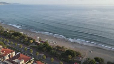 This stock footage shows aerial view of Alanya, Turkey - a resort town on the seashore in 8K resolution
