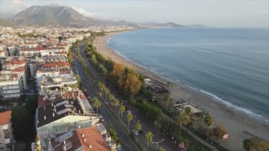 This stock footage shows aerial view of Alanya, Turkey - a resort town on the seashore in 8K resolution