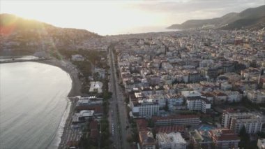 This stock footage shows aerial view of Alanya, Turkey - a resort town on the seashore in 8K resolution