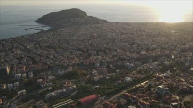 This stock footage shows aerial view of Alanya, Turkey - a resort town on the seashore in 8K resolution