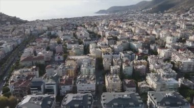 This stock footage shows aerial view of Alanya, Turkey - a resort town on the seashore in 8K resolution