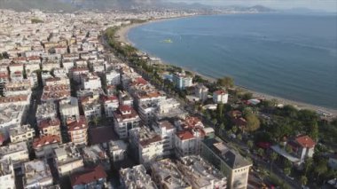 This stock footage shows aerial view of Alanya, Turkey - a resort town on the seashore in 8K resolution